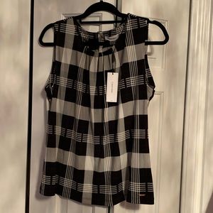 Calvin Klein’s sleeveless top! NEW with tags!